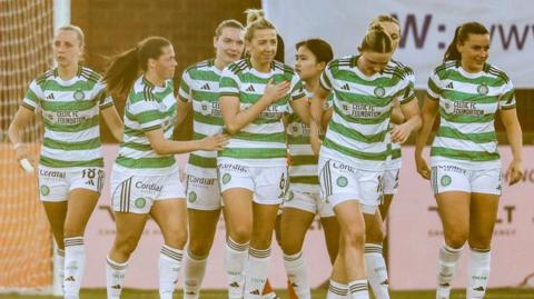 Celtic players celebrate