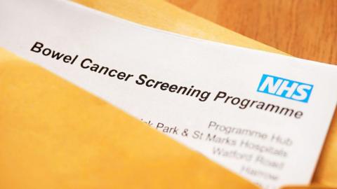 NHS screening program documents in a manilla folder.