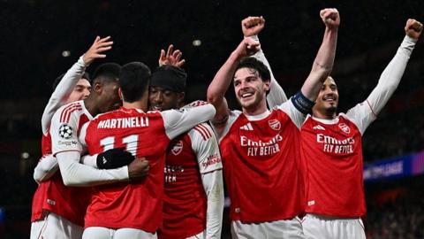 Arsenal's players celebrate their victory over Bayern Munich