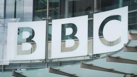The BBC logo above the entrance to New Broadcasting House in London. 