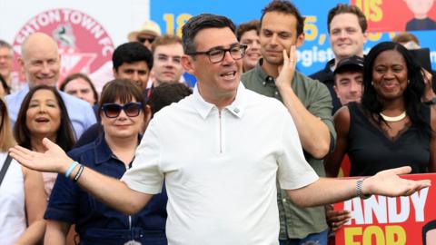 New Labour Party MP for Makerfield, Andy Burnham speaks to supporters and members of the media, the morning after his by-election victory, at Ashton Town FC, in Ashton in Makerfield, north-west England on June 19, 2026.