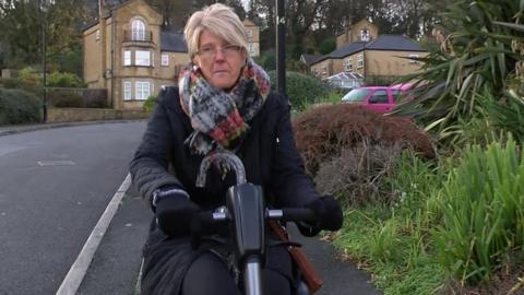 Sharon Jackson on a mobility scooter