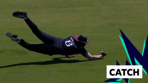 Pakistan's Mohammad Rizwan is caught out after a sensational diving catch from USA's Steven Taylor