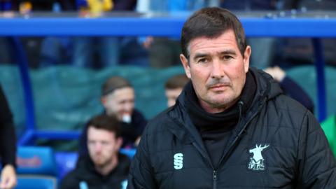 Mansfield Town boss Nigel Clough on the sideline