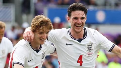 Anthony Gordon and Declan Rice celebrate