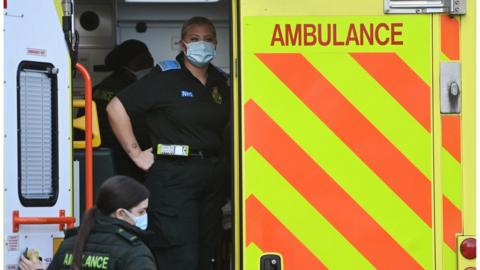 NHS ambulances staff outside a hospital in London