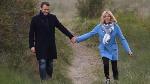 Emmanuel Macron and his wife Brigitte Trogneux