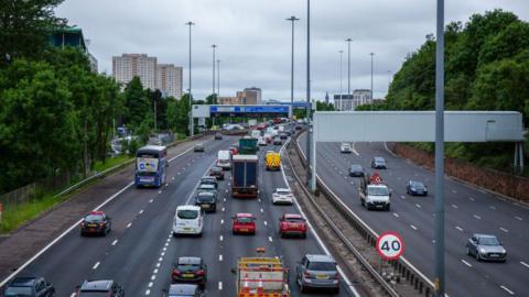 Cars streaming along a stretch of the M8 in Glasgow