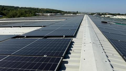 A stretch of roof showing solar panels