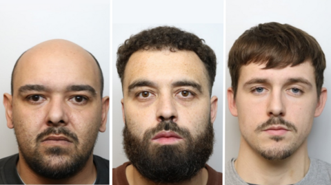 A composite image showing three police mugshots. On the left there is Jamie Milligan, who has dark eyes, a bald head, beard, bushy eyebrows and is wearing a black t-shirt. In the middle there is Lewis Turner, with brown eyes, a full bushy beard and dark hair, wearing a brown t-shirt. On the right there is Liam Meager who has light brown hair, blue eyes and a moustache, wearing a grey t-shirt. 