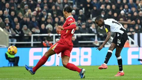 Alexander Isak scores against Liverpool