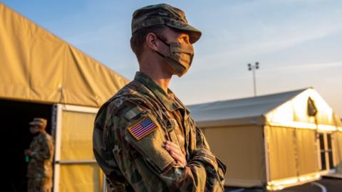 US soldier in Germany, where thousands of overseas troops are based