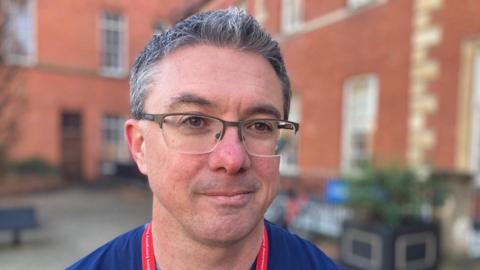 A close-up picture of Prof Damian Roland