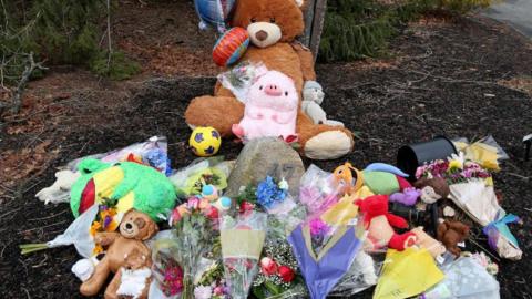 A makeshift memorial outside the home of Lindsay Clancy