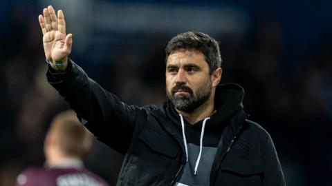 Vitor Matos waves to Swansea fans after defeat at West Brom