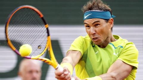 Rafael Nadal of Spain plays a forehand against Felix Auger-Aliassime of Canada during the Men's Singles Fourth Round match on Day 8 of The 2022 French Open at Roland Garros on May 29, 2022