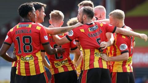 Partick thistle players celebrate Kevin Holt's opening goal