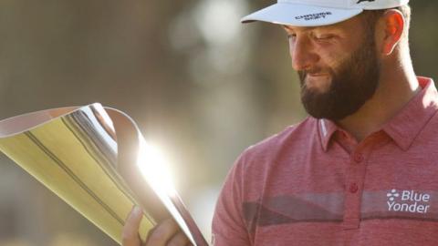 Jon Rahm with the trophy after winning the Genesis Invitational