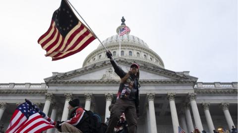 Pro-Trump protesters storm the grounds of the East Front of the US Capitol, in Washington, DC, USA, 06 January 2021. Various groups of Trump supporters have broken into the US Capitol and rioted as Congress prepares to meet and certify the results of the 2020 US Presidential election.