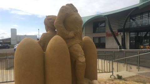 Damaged sand sculpture