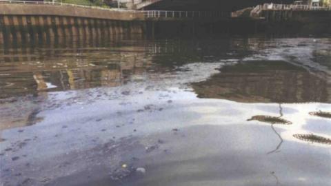 Raw sewage in river