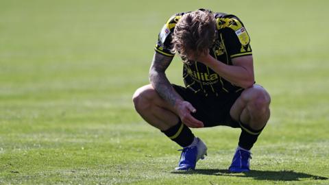 Bristol Rovers' Luke McCormick looks dejected following relegation