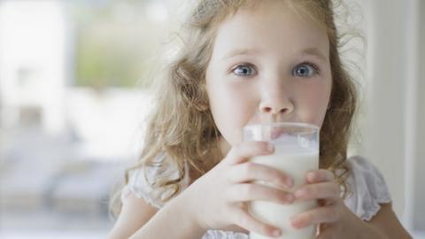 girl drinking milk