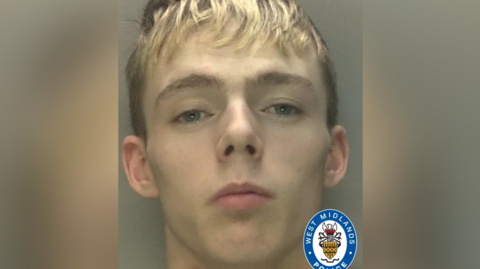 A police mugshot of a man, Jayke Bullivant, who has short blond hair with a fringe.