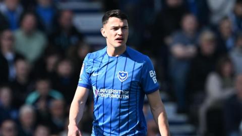 Regan Poole on the pitch during a match