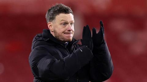 Middlesbrough manager Kim Hellberg applauds the fans after their goalless draw with Blackburn