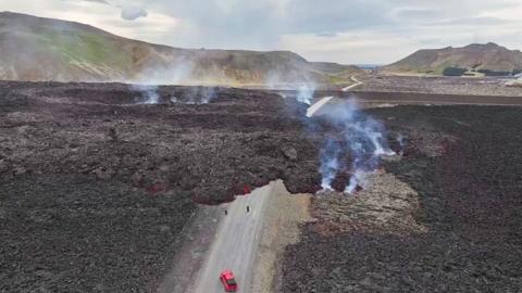 Lava engulfs road in Iceland