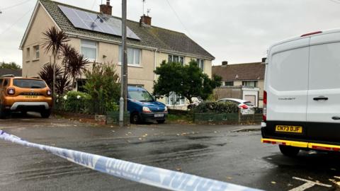 Semi-detached house on Morfa Crescent in Trowbridge. With police tape on foreground