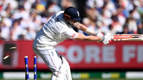 Gus Atkinson is dismissed after being bowled