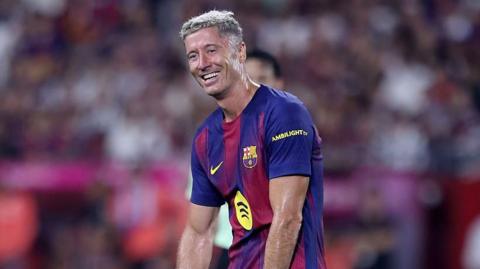 Robert Lewandowski reacts during a match for Barcelona