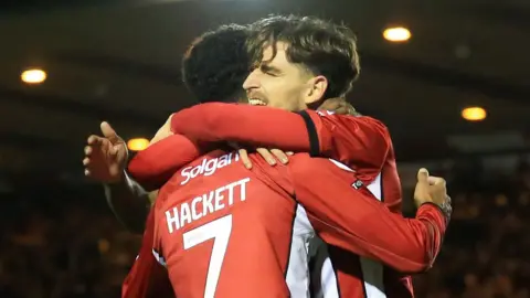 Lincoln celebrate second goal against Barnsley