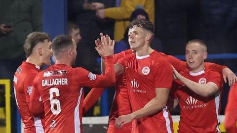 Leroy Millar celebrating