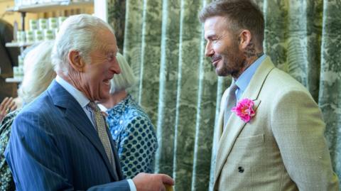 King Charles greets David Beckham during a visit to the RHS Chelsea Flower Show