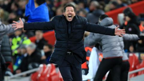 Atletico Madrid manager Diego Simeone celebrates his team scoring against Liverpool at Anfield