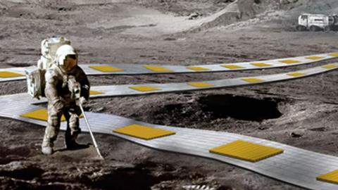 An artist's impression of what a lunar railway might look like, showing astronauts walking next to a track with magnets on the Moon
