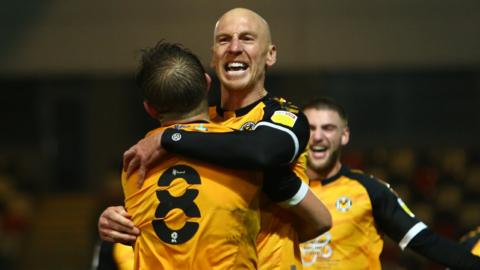 Kevin Ellison celebrates his late goal