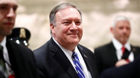 Pompeo smiling