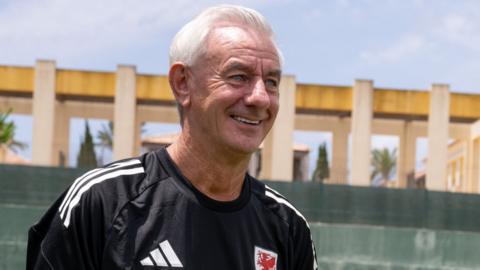Ian Rush smiling in Wales training kit