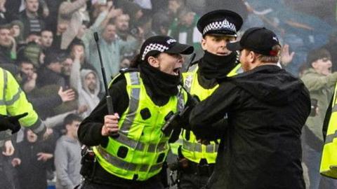 Old Firm fans clash