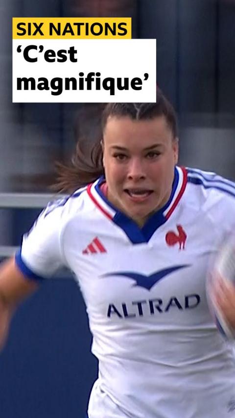 Lea Murie runs with rugby ball 