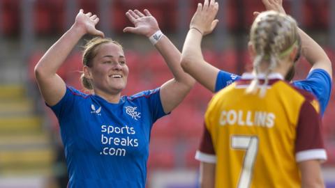 Katie Wilkinson celebrates