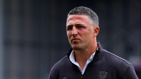 Sam Burgess looks on while in charge of Warrington Wolves against Leigh Leopards earlier this season