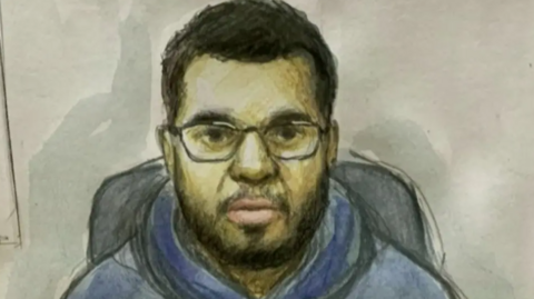 Kadees is depicted in an artist's impression. He has glasses on and is wearing a blue top.