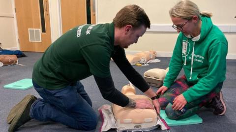 A member of Kesgrave Kruisers learning CPR