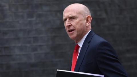 British Secretary of State for Defence John Healey arrives for a cabinet meeting at 10 Downing Street in London, Britain, 24 March 2026.