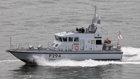 The HMS Trumpeter is pictured sailing with a crew on board. 
